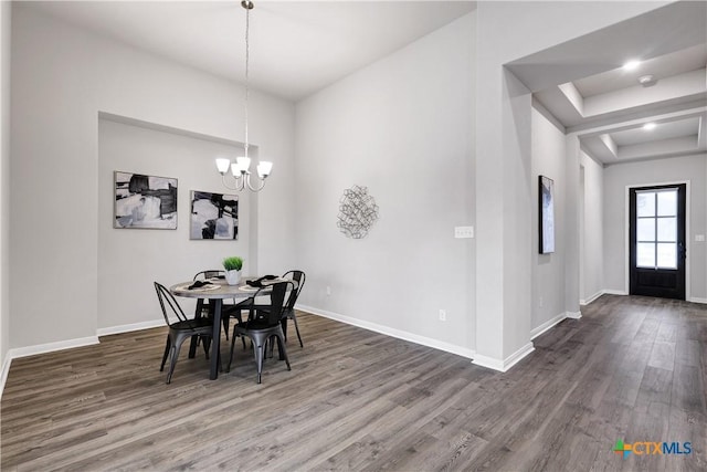 513 Foxbrook Way, Cibolo, TX 78108 - dining area featuring wood finished floors, a chandelier, and baseboards