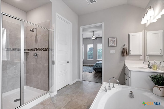 513 Foxbrook Way, Cibolo, TX 78108 - ensuite bathroom with a shower stall, vanity, a bath, a ceiling fan, and tile patterned floors