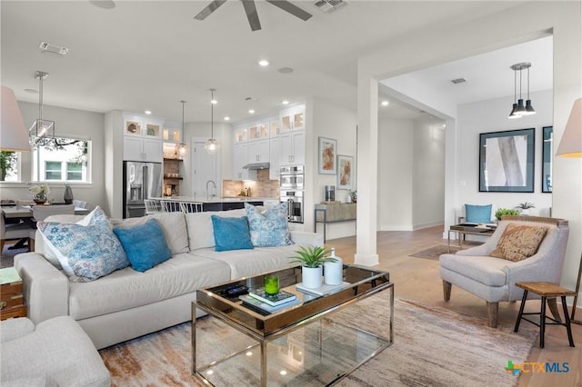 105 Monterey Oak Trl, Georgetown, TX 78628 - living area with ceiling fan, recessed lighting, and baseboards