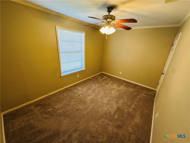 225 Monterrey Dr, Victoria, TX 77904 - spare room featuring ornamental molding, dark colored carpet, ceiling fan, and baseboards