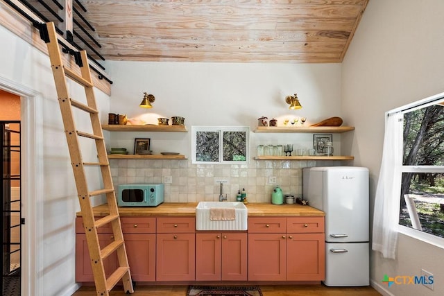 200 W Meadow Ln, Wimberley, TX 78676 - kitchen featuring wooden counters, white appliances, a sink, open shelves, and wood ceiling