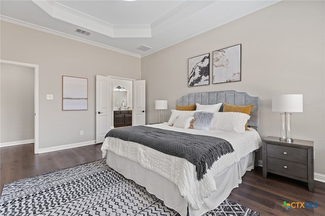 3312 Cortes Pl, Round Rock, TX 78665 - bedroom featuring a tray ceiling, wood finished floors, crown molding, and baseboards