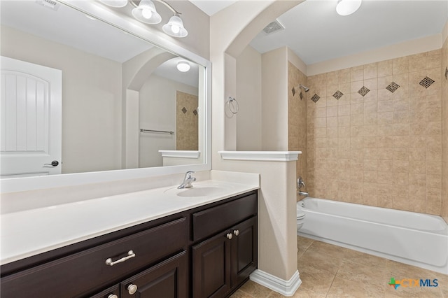 3312 Cortes Pl, Round Rock, TX 78665 - full bathroom featuring vanity, tub / shower combination, tile patterned flooring, and toilet