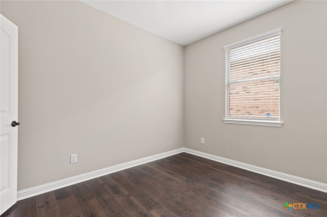 3312 Cortes Pl, Round Rock, TX 78665 - empty room with dark wood-style floors and baseboards
