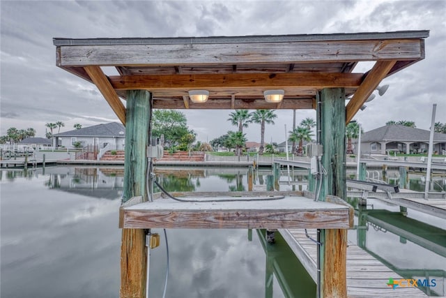 view of dock with a water view