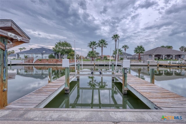 dock area featuring a water view