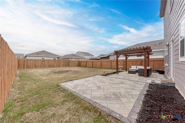 rear view of house with a pergola and a lawn