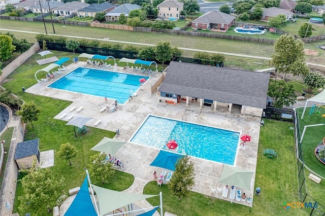 view of swimming pool with a patio area