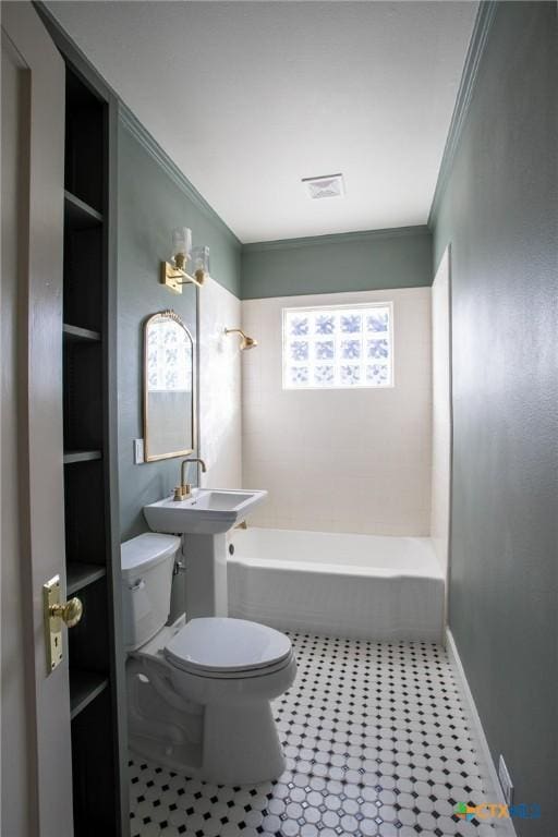 full bathroom featuring sink, shower / bathing tub combination, ornamental molding, and toilet