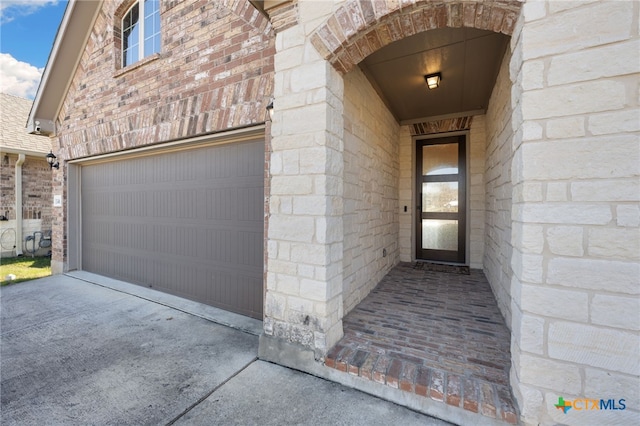 property entrance featuring a garage