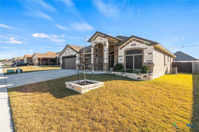 view of front facade with a front lawn and a garage