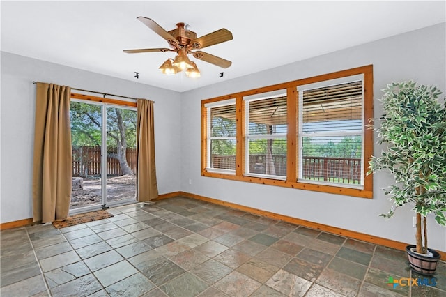 empty room featuring ceiling fan