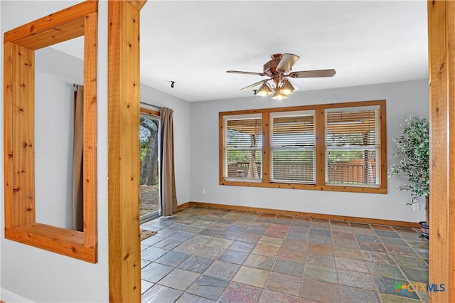 empty room with ceiling fan