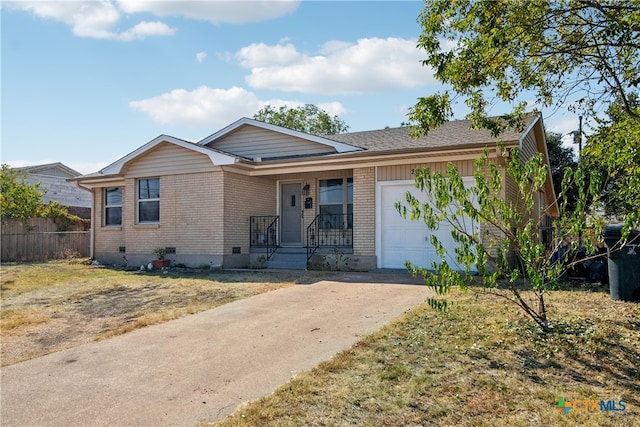 ranch-style house featuring a garage