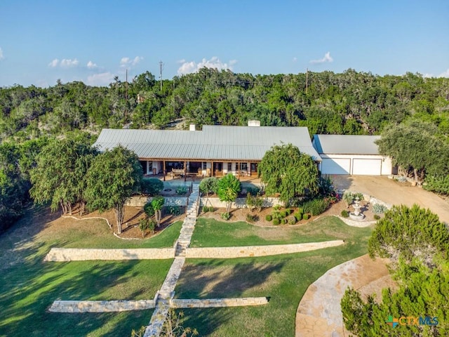 ranch-style home featuring a front yard