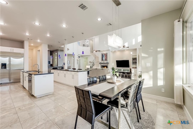 dining area featuring sink