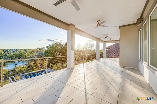 view of patio with a balcony