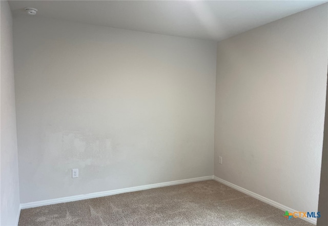 19712 Abigail Fillmore Rd, Manor, TX 78653 - carpeted empty room with baseboards and a smoke detector