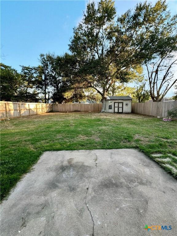 5407 Shirley St, Baytown, TX 77521 - view of yard featuring a patio area and an outdoor structure