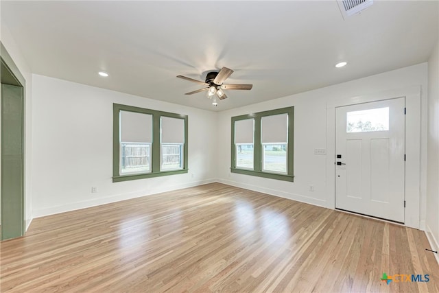 entryway with light wood-type flooring and ceiling fan