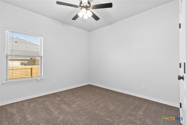 unfurnished room with carpet flooring and ceiling fan