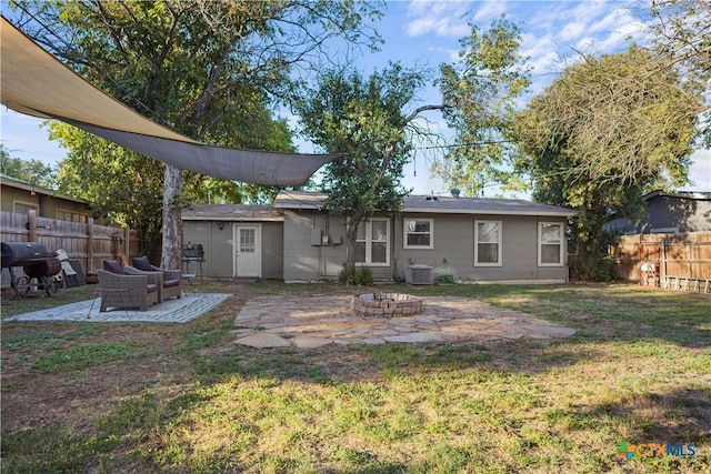138 Antrim Dr, San Antonio, TX 78218 - rear view of property featuring a fire pit, a patio, and central AC unit