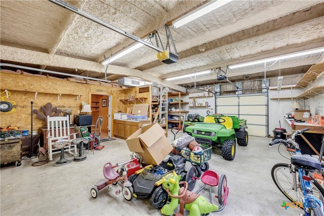 garage featuring a garage door opener