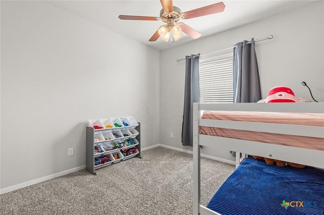 bedroom with baseboards, carpet, and ceiling fan