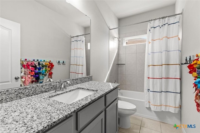 bathroom with tile patterned flooring, vanity, toilet, and shower / bathtub combination with curtain