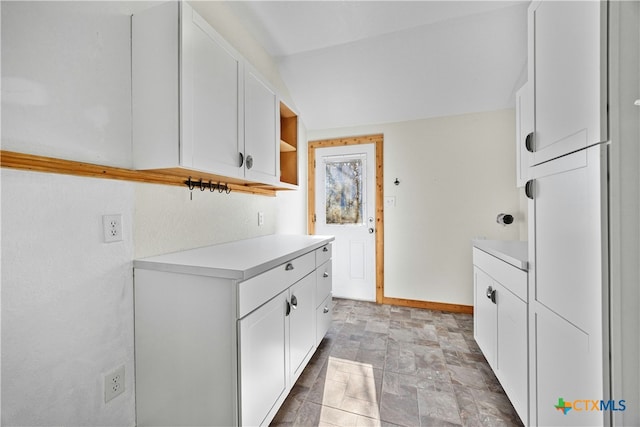 kitchen featuring white cabinetry