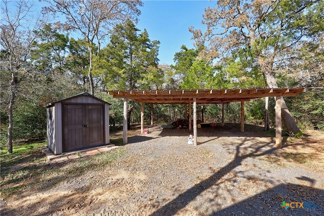 view of yard with a pergola and a shed