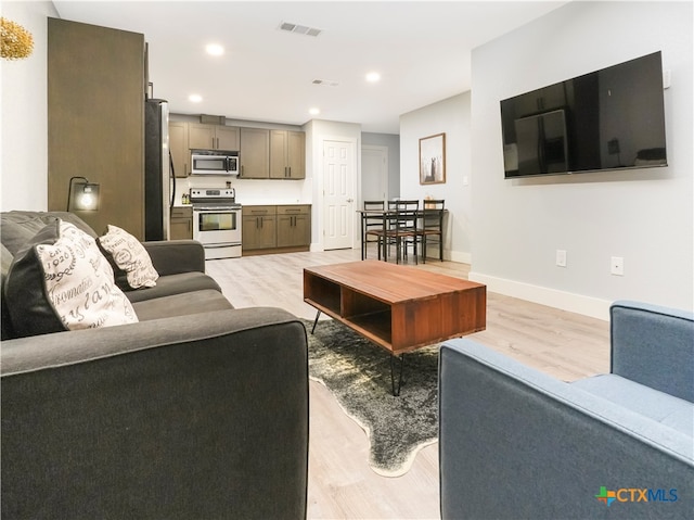 living room with light wood-type flooring