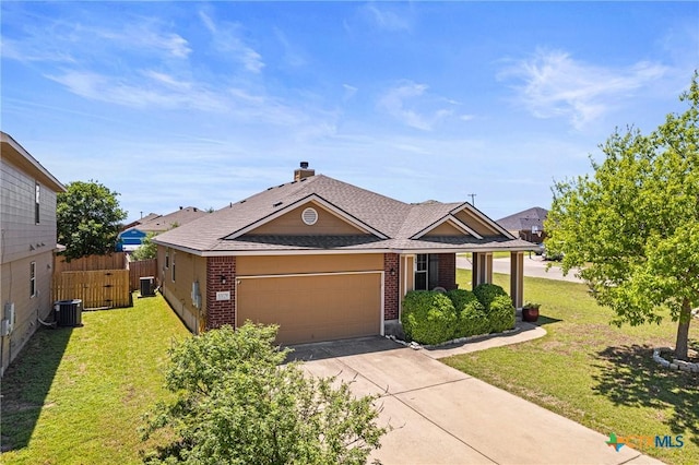 view of front of home with an attached garage, a front lawn, brick siding, and concrete driveway