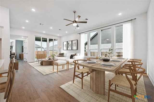264 Five Mile Creek Way, Kyle, TX 78640 - dining area with a ceiling fan, wood finished floors, and recessed lighting