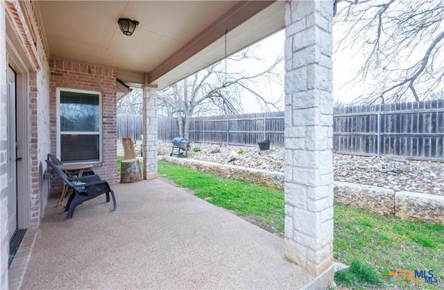 602 Park Place Ln, Temple, TX 76504 - fenced backyard featuring a patio