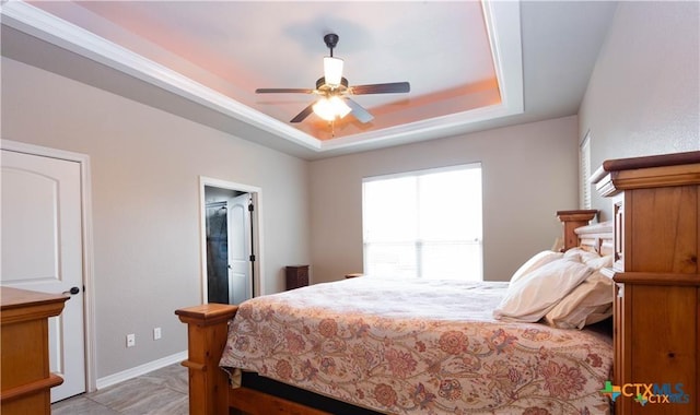 602 Park Place Ln, Temple, TX 76504 - bedroom with a tray ceiling and ceiling fan