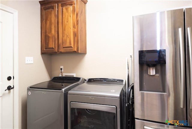 602 Park Place Ln, Temple, TX 76504 - laundry room featuring cabinet space and washer and dryer