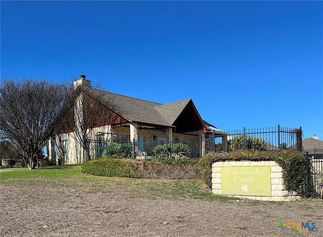 602 Park Place Ln, Temple, TX 76504 - view of side of home with a chimney