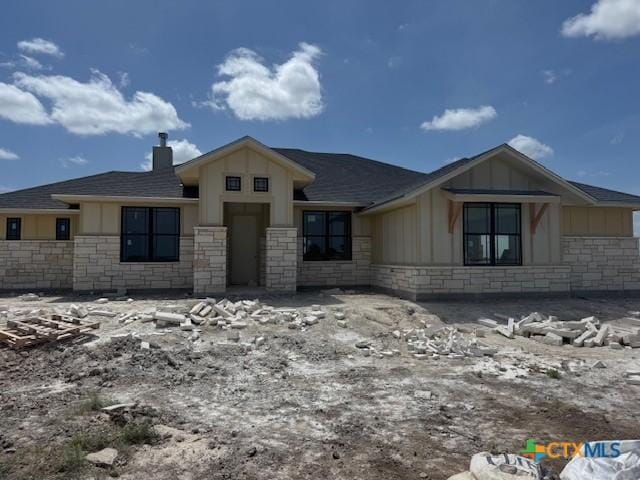 490 County Road 56, Copperas Cove, TX 76522 - view of front of property with stone siding, board and batten siding, roof with shingles, and a chimney