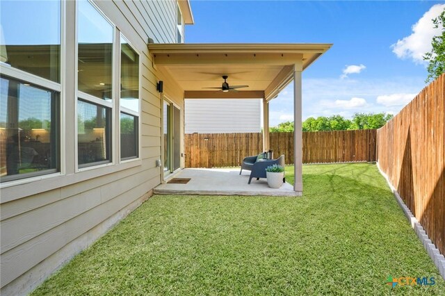 15806 Celosia St, Austin, TX 78728 - view of yard featuring a patio area, a fenced backyard, and a ceiling fan