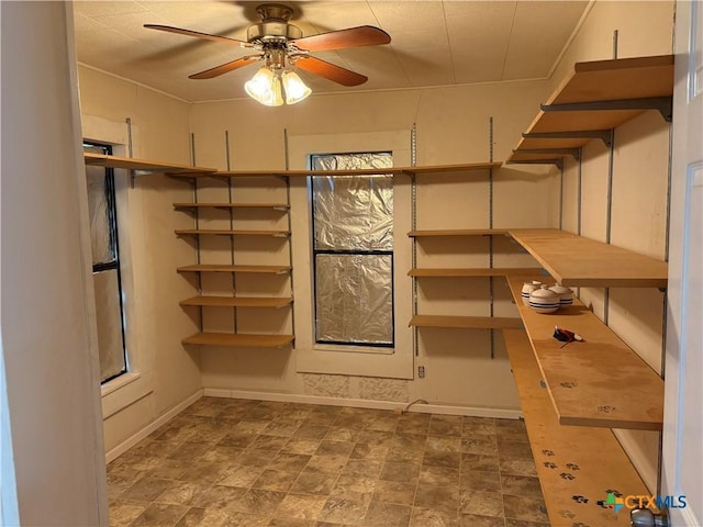 904 Deer Springs Dr, Burnet, TX 78611 - spacious closet featuring ceiling fan