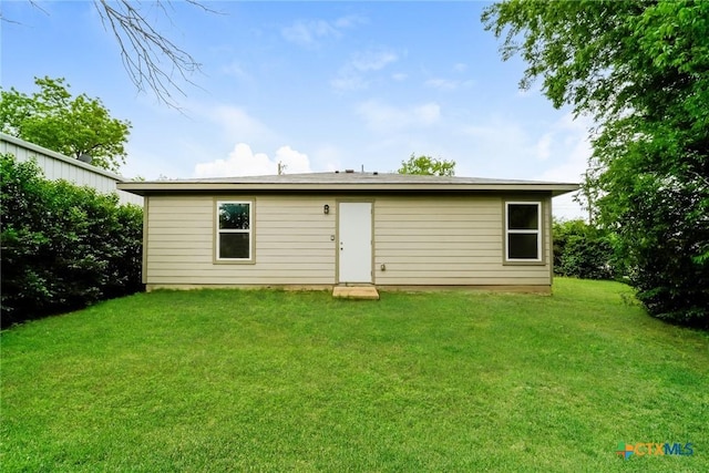 613 S 24th St, Temple, TX 76501 - rear view of house with a lawn
