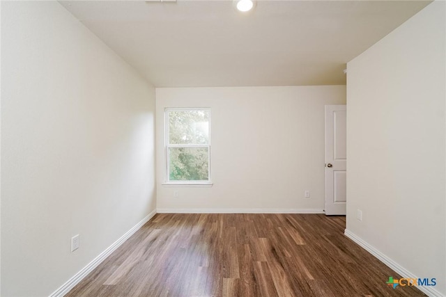 613 S 24th St, Temple, TX 76501 - spare room featuring wood finished floors and baseboards
