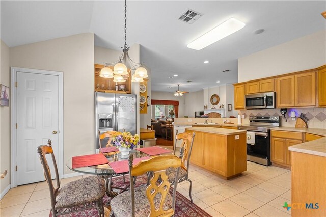 301 Deerchase, Victoria, TX 77901 - dining space featuring light tile patterned floors, lofted ceiling, and recessed lighting