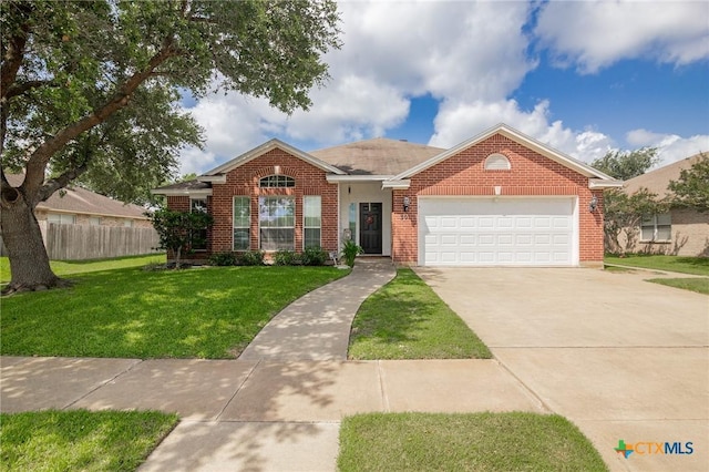 301 Deerchase, Victoria, TX 77901 - traditional-style home with a garage, driveway, and brick siding