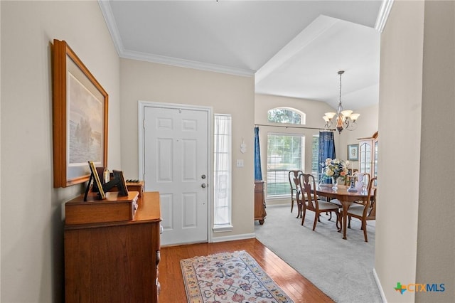 301 Deerchase, Victoria, TX 77901 - entryway featuring a chandelier, wood finished floors, ornamental molding, and baseboards