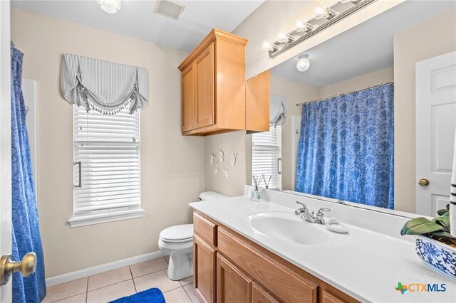 301 Deerchase, Victoria, TX 77901 - full bathroom featuring vanity, toilet, tile patterned floors, and baseboards