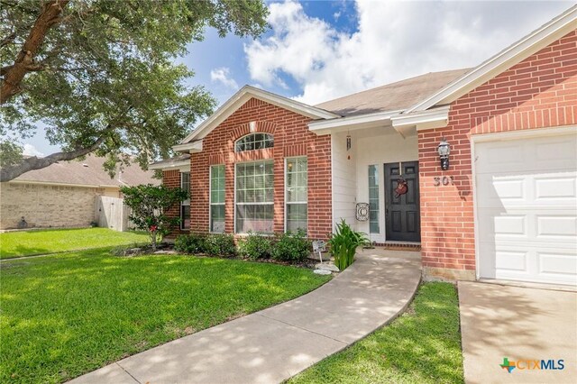 301 Deerchase, Victoria, TX 77901 - view of front of property featuring brick siding and a garage