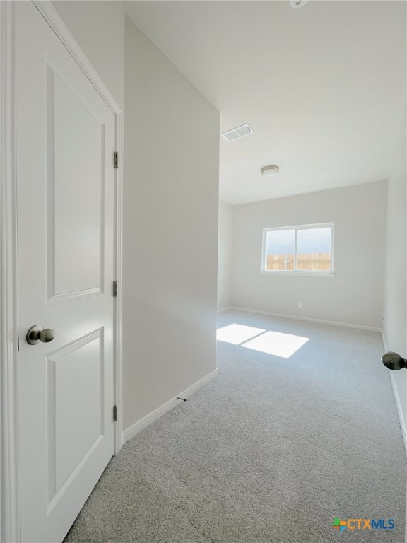 unfurnished room with carpet