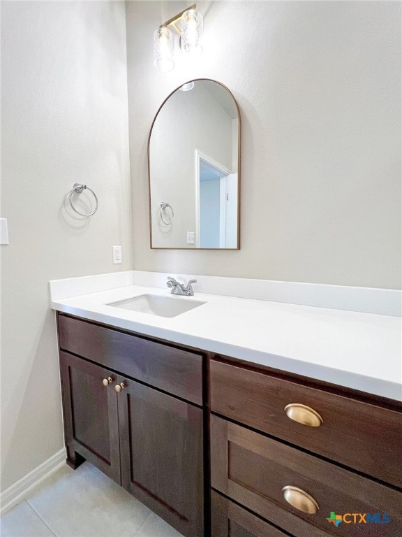 bathroom with vanity and tile patterned floors